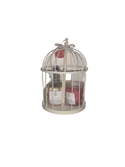 Petite cage blanche avec bougie et diffuseur de parfum à la rose